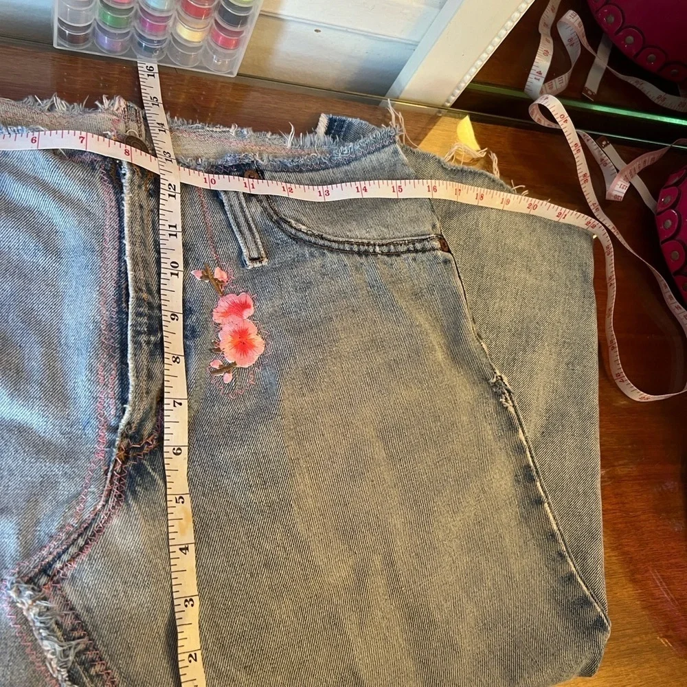 Handmade A-Line Denim Skirt with Cherry Blossom patches and Zipper Closure.